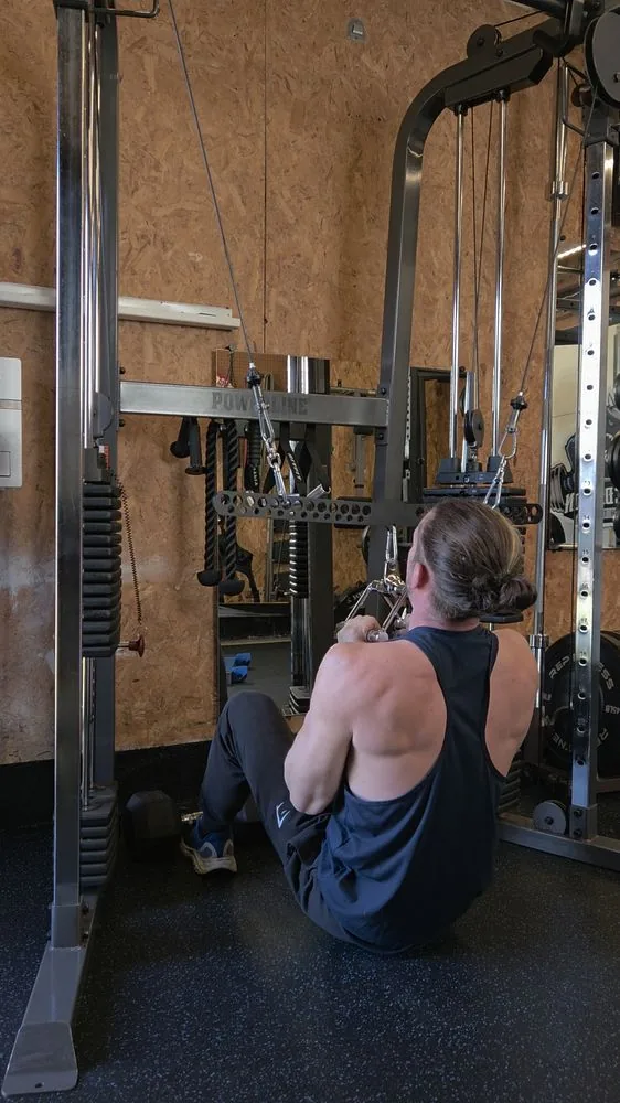 Seated cable row training at Stone Dragon Strength Training in Tacoma, WA