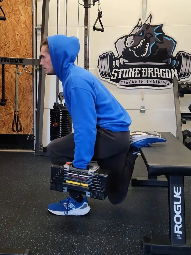 Dumbbell squat to bench at Stone Dragon Strength Training